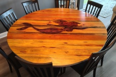 6\"round heartpine dining table wrapped in metal with cedar base!!